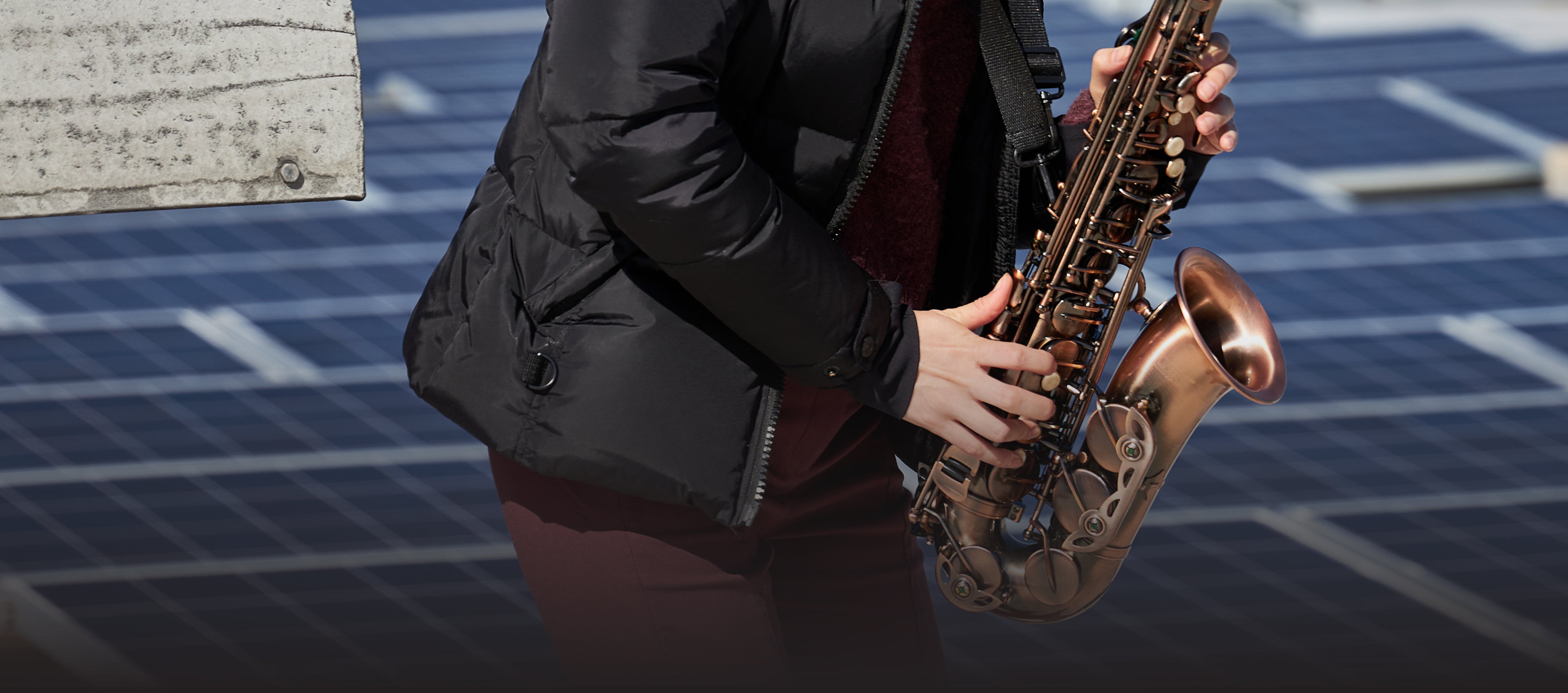 person playing e flat alto sax 