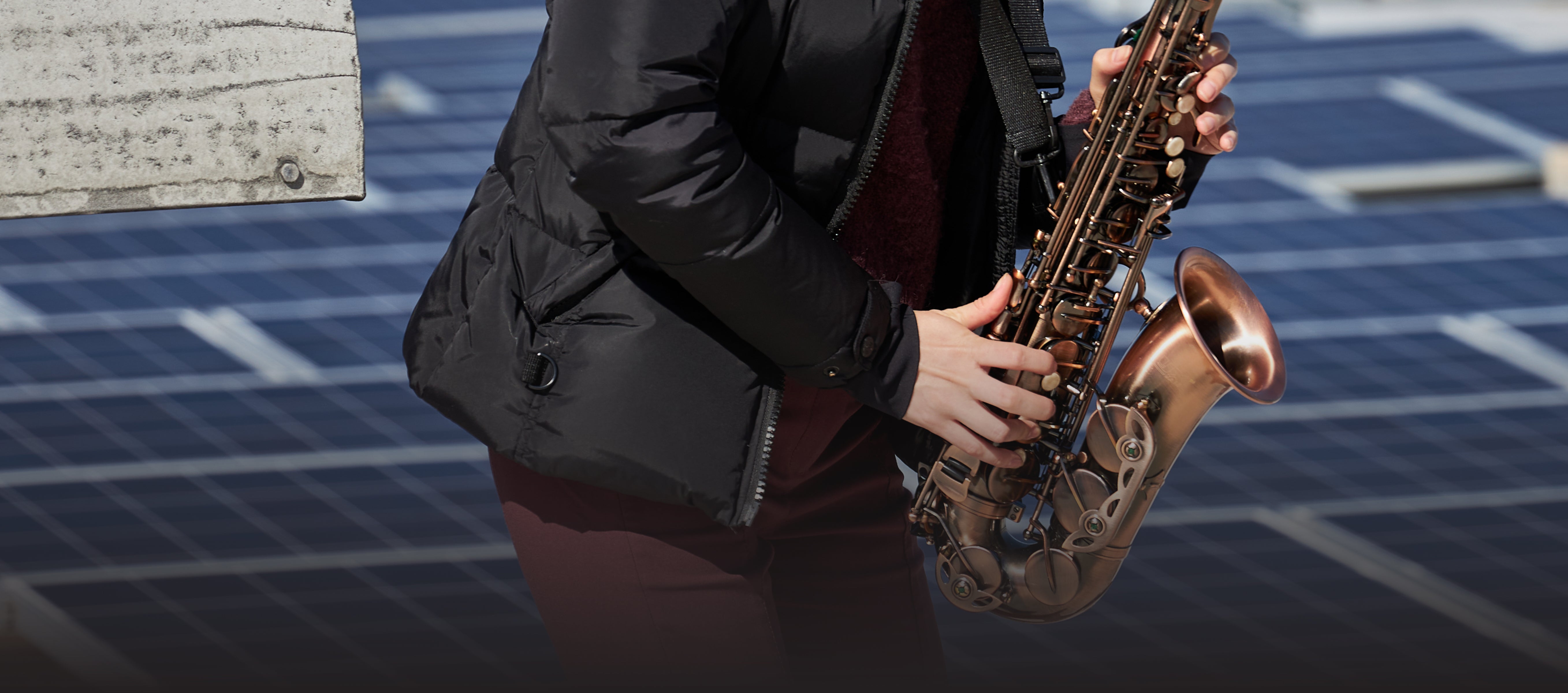 person playing e flat alto sax