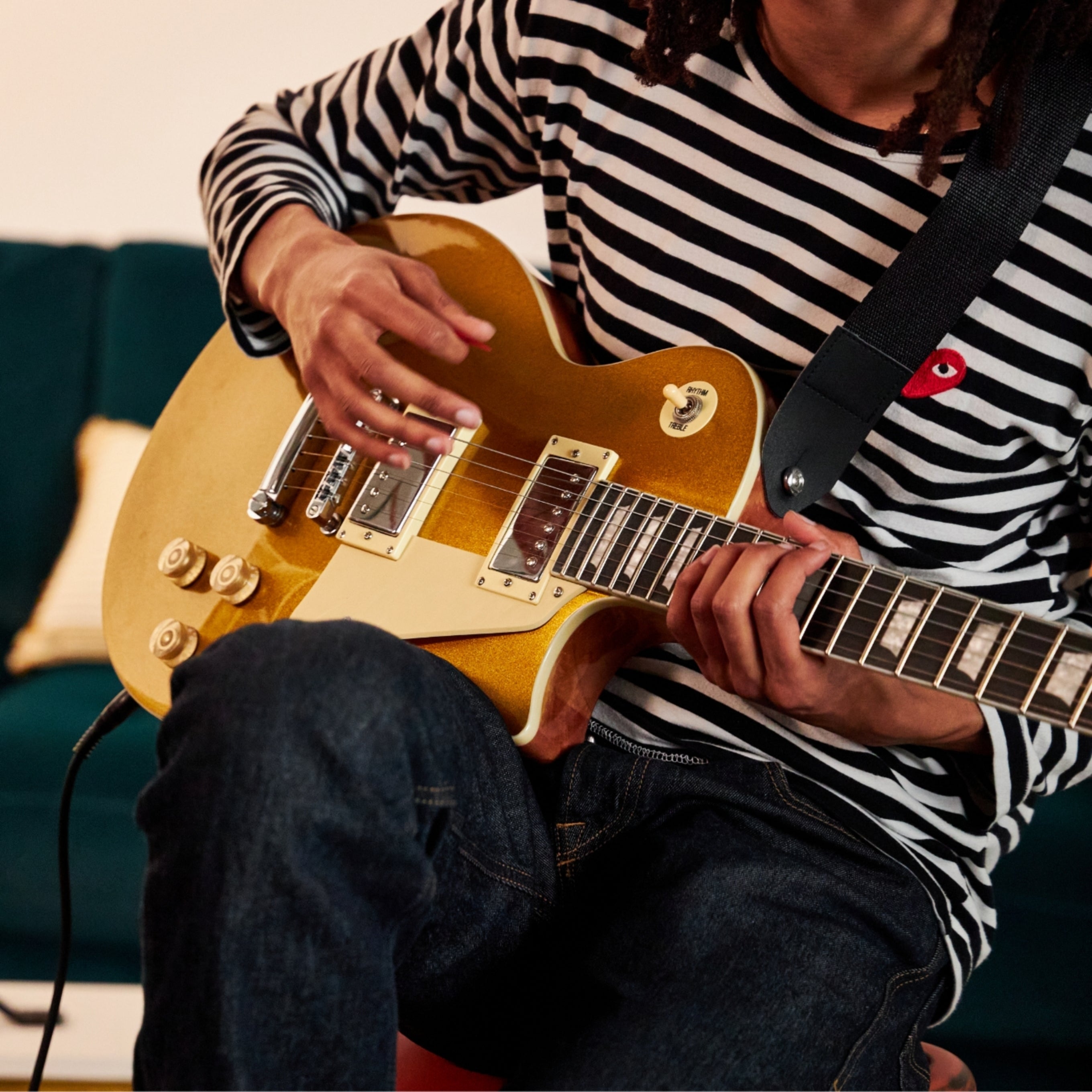 Artist playing a LyxPro Guitar