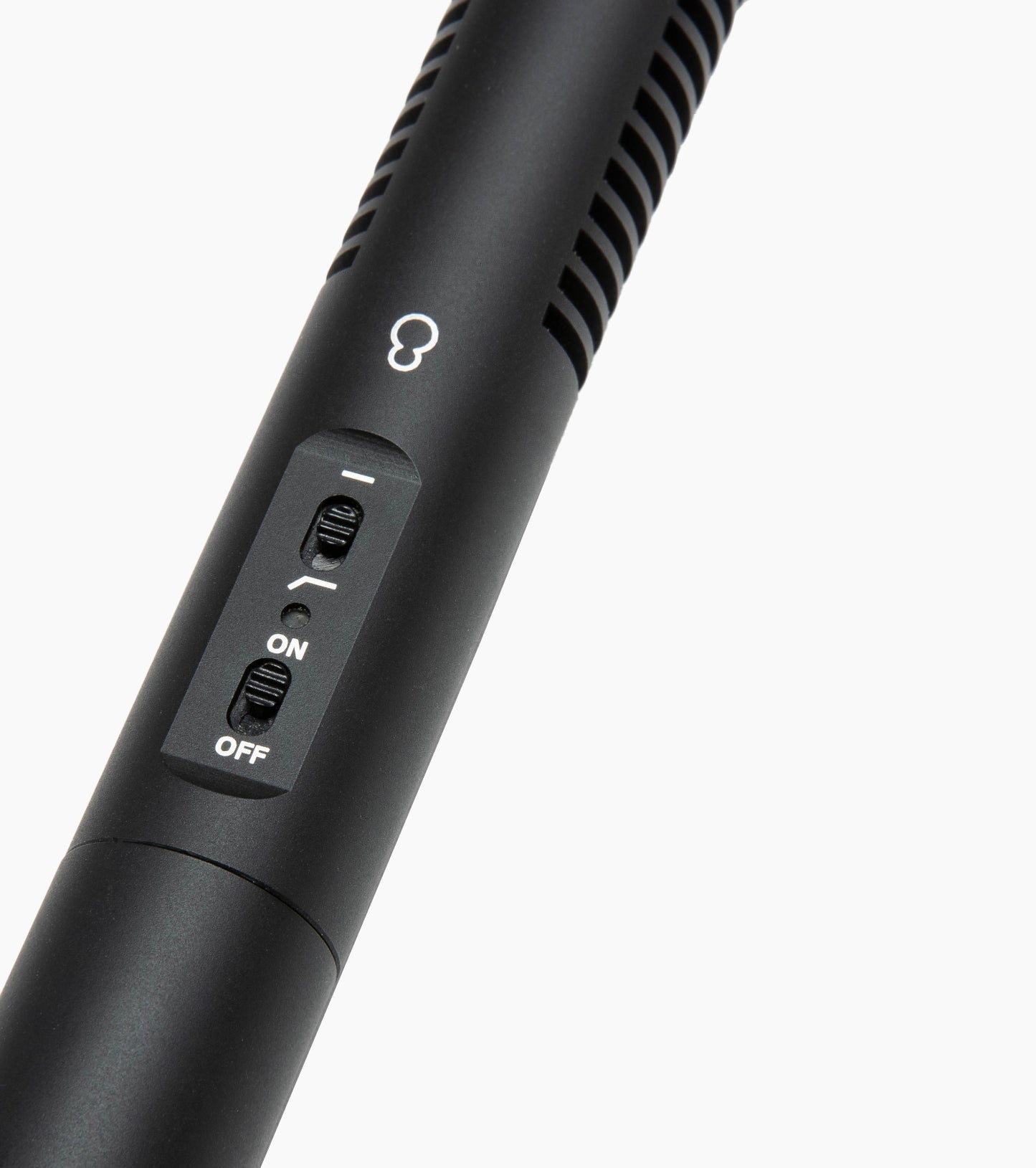 close-up of shotgun microphone on/off switch
