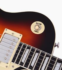 close-up of Sunburst les paul inspired electric guitar pickup selector switch