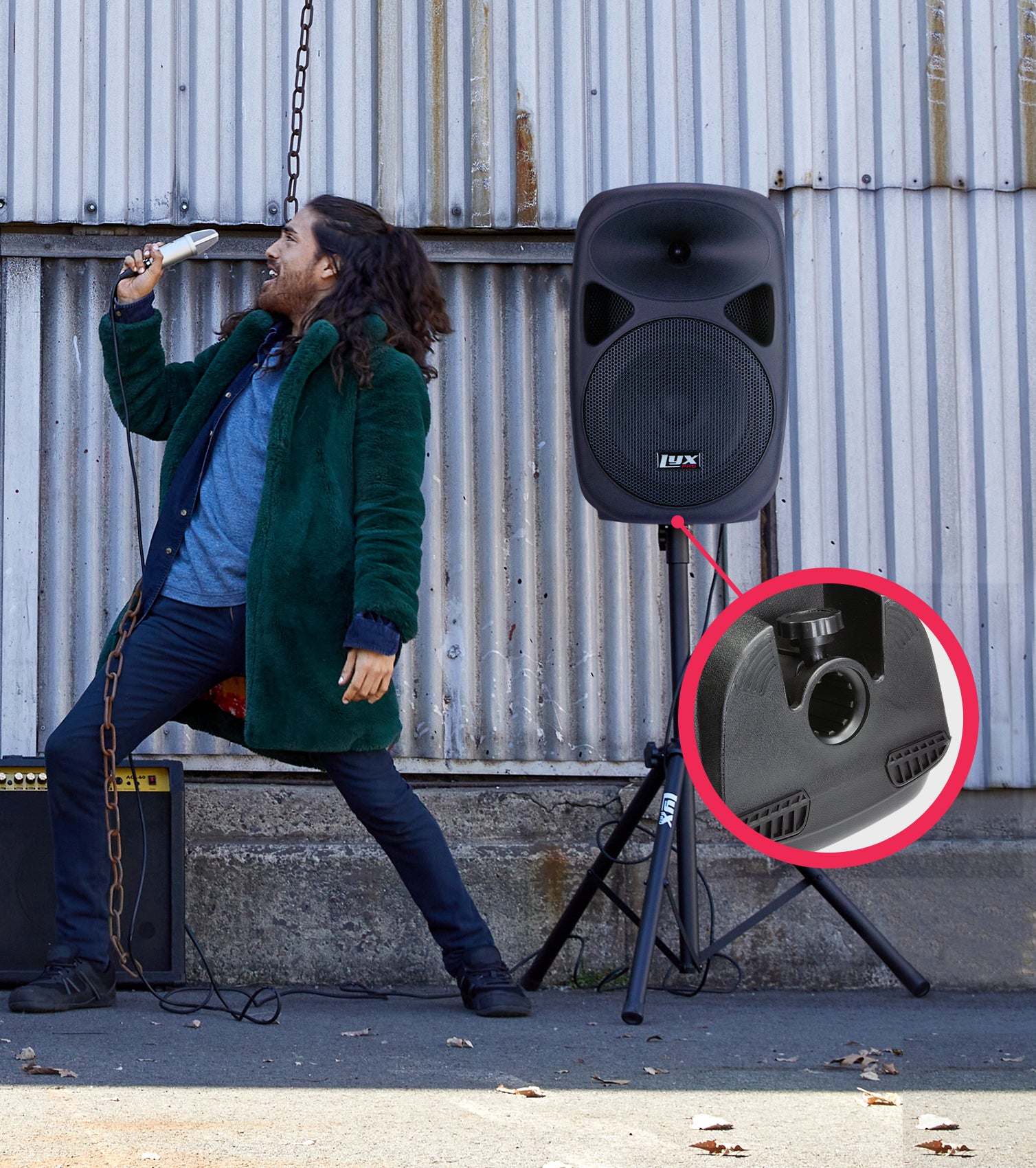person singing alongside mounted 15” portable battery-powered PA speaker