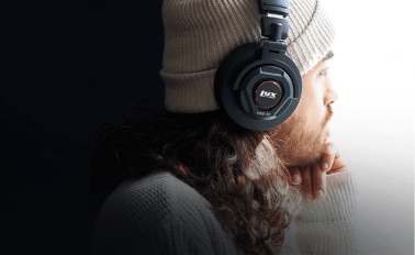 Person listening on LyxPro Studio Quality Headphones