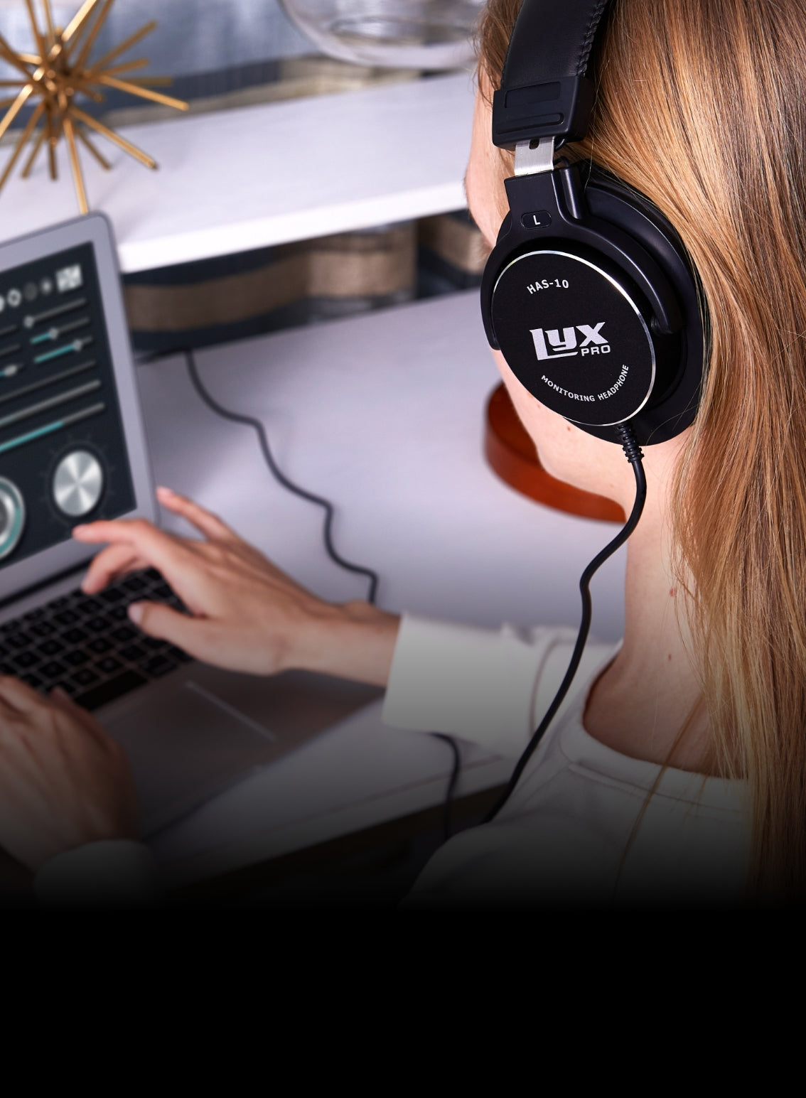  a person listening on professional studio headphones 