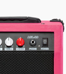 close-up of pink 20 watt electric guitar amplifier controls