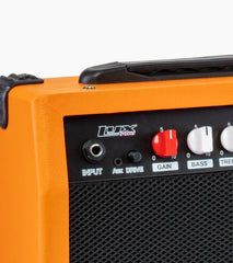 close-up of sunburst 20 watt electric guitar amplifier controls   