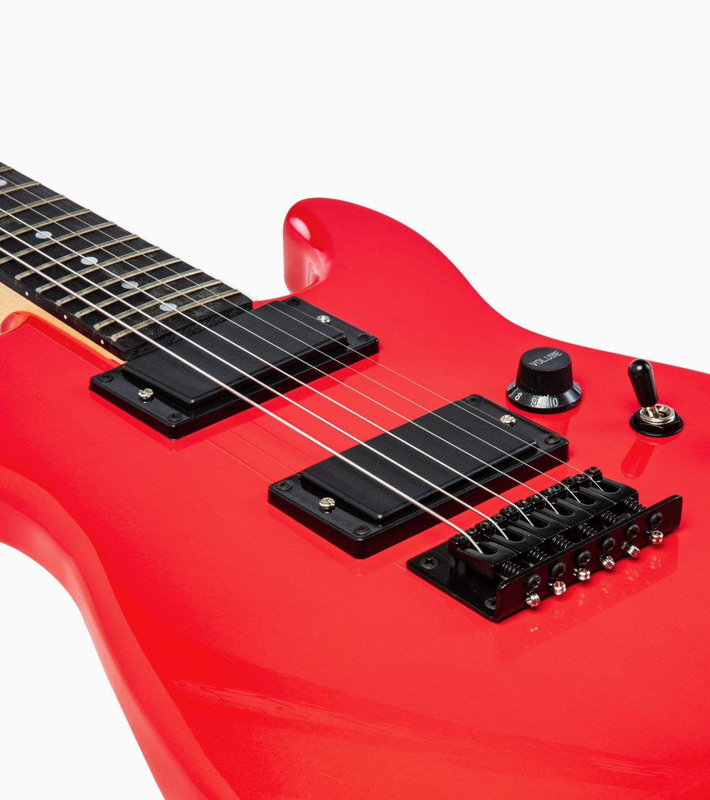 close-up of 36” red beginner electric guitar  