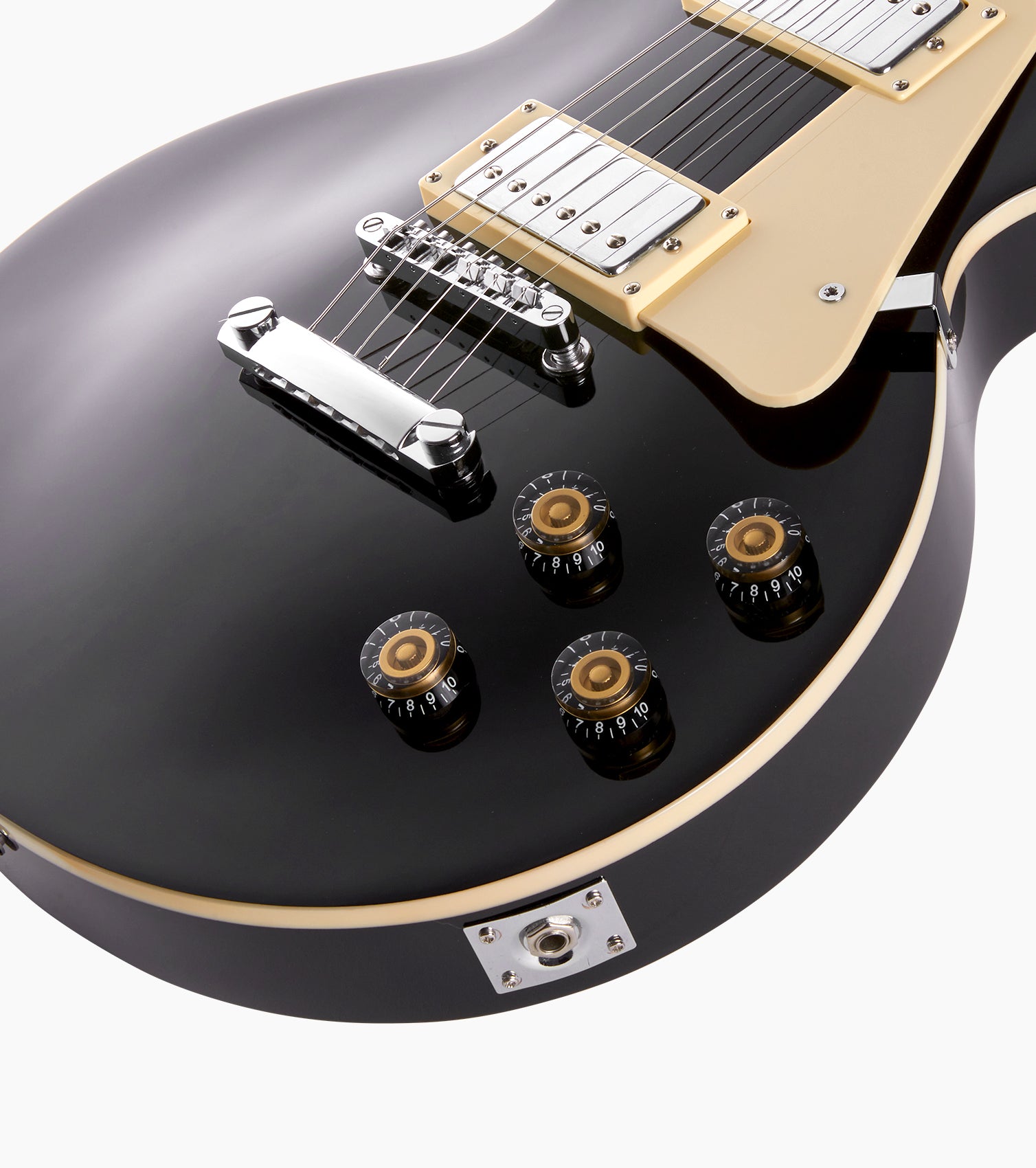 close-up of black beginner les paul inspired guitar knobs