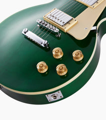 close-up of Green beginner les paul inspired guitar knobs
