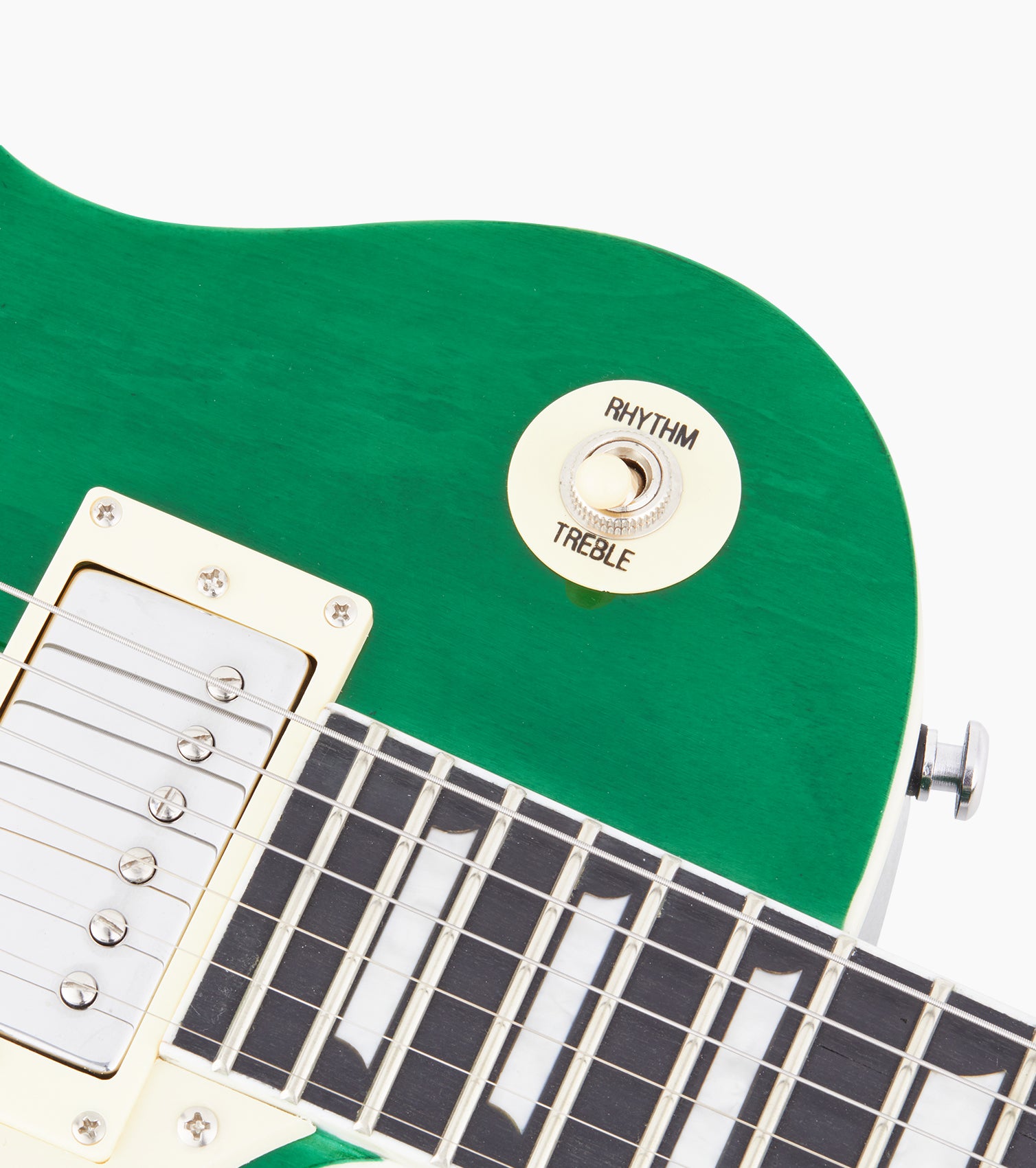 close-up of Green les paul inspired electric guitar pickup selector switch
