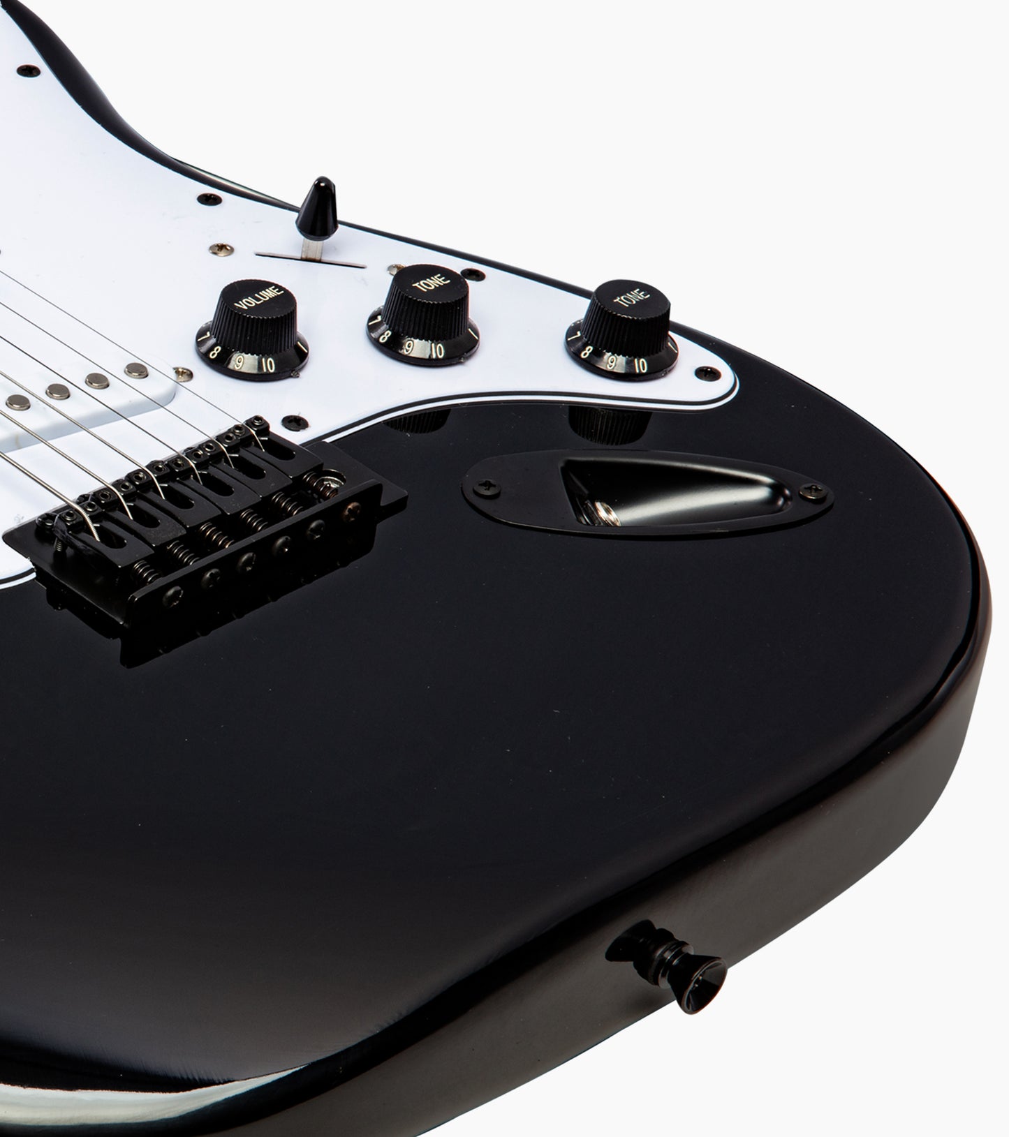 close-up of black double-cutaway beginner electric guitar