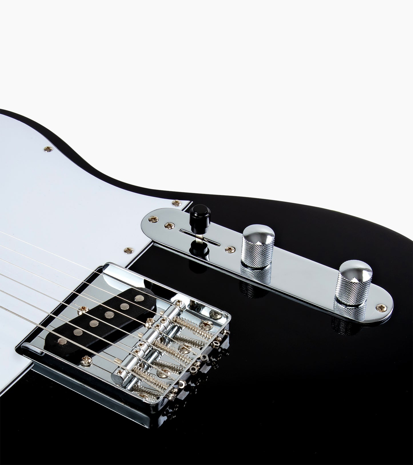 close-up of black single-cutaway electric guitar knobs  