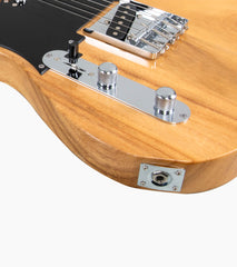 close-up of a Left Handed Natural single-cutaway electric guitar audio port