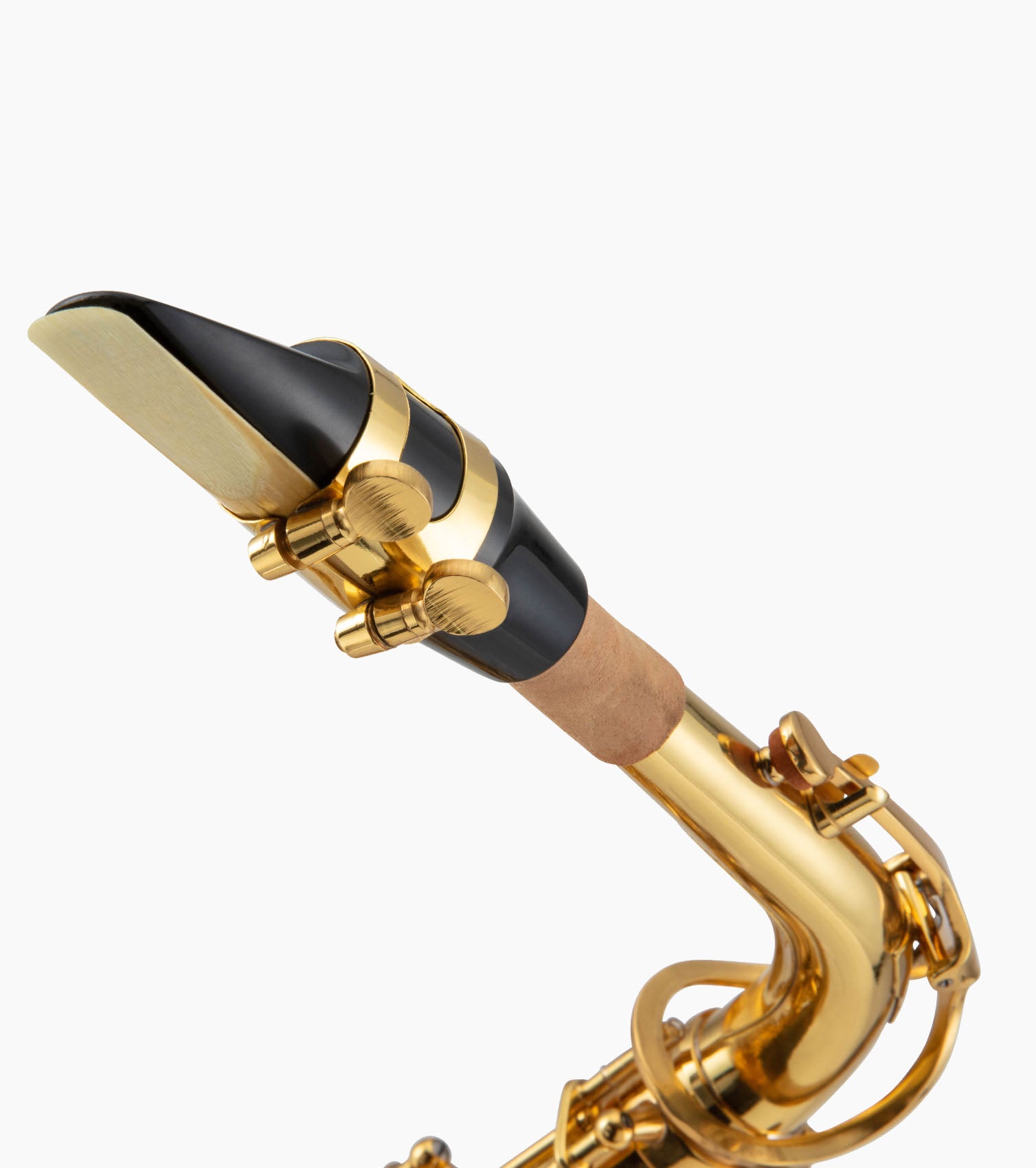 close-up of gold e flat alto sax mouthpiece 