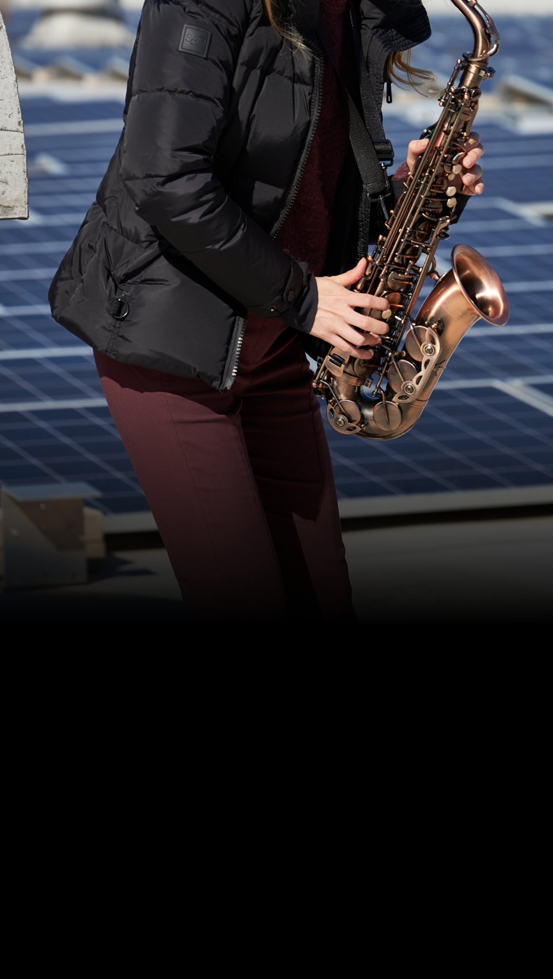 person playing e flat alto sax 